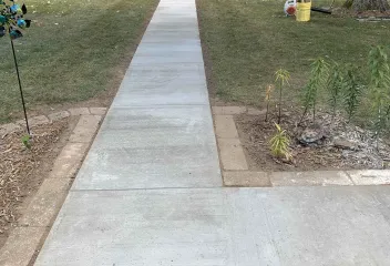 sidewalk and trimmed lawn