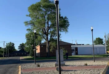 light post next to flag